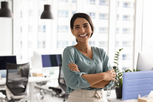 Mindy With Her Arms Crossed Smiling 600X400